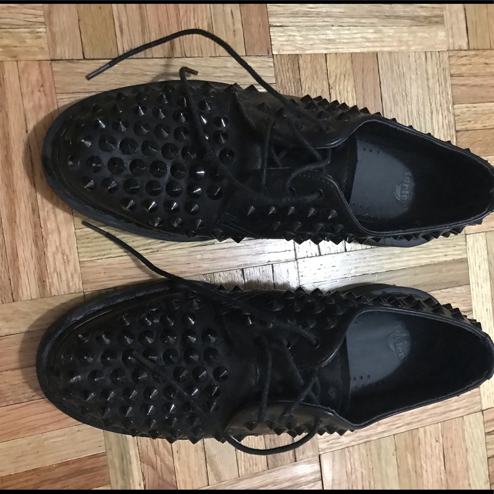 Dr Martens Harlen spiked shoes.